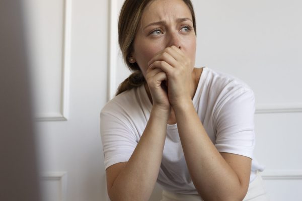 front-view-anxious-woman-indoors